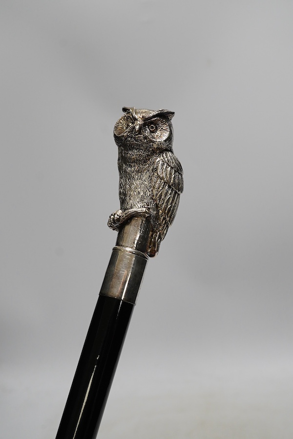 A modern 925 mounted 'owl' walking cane, 95cm. Condition - some light scratching